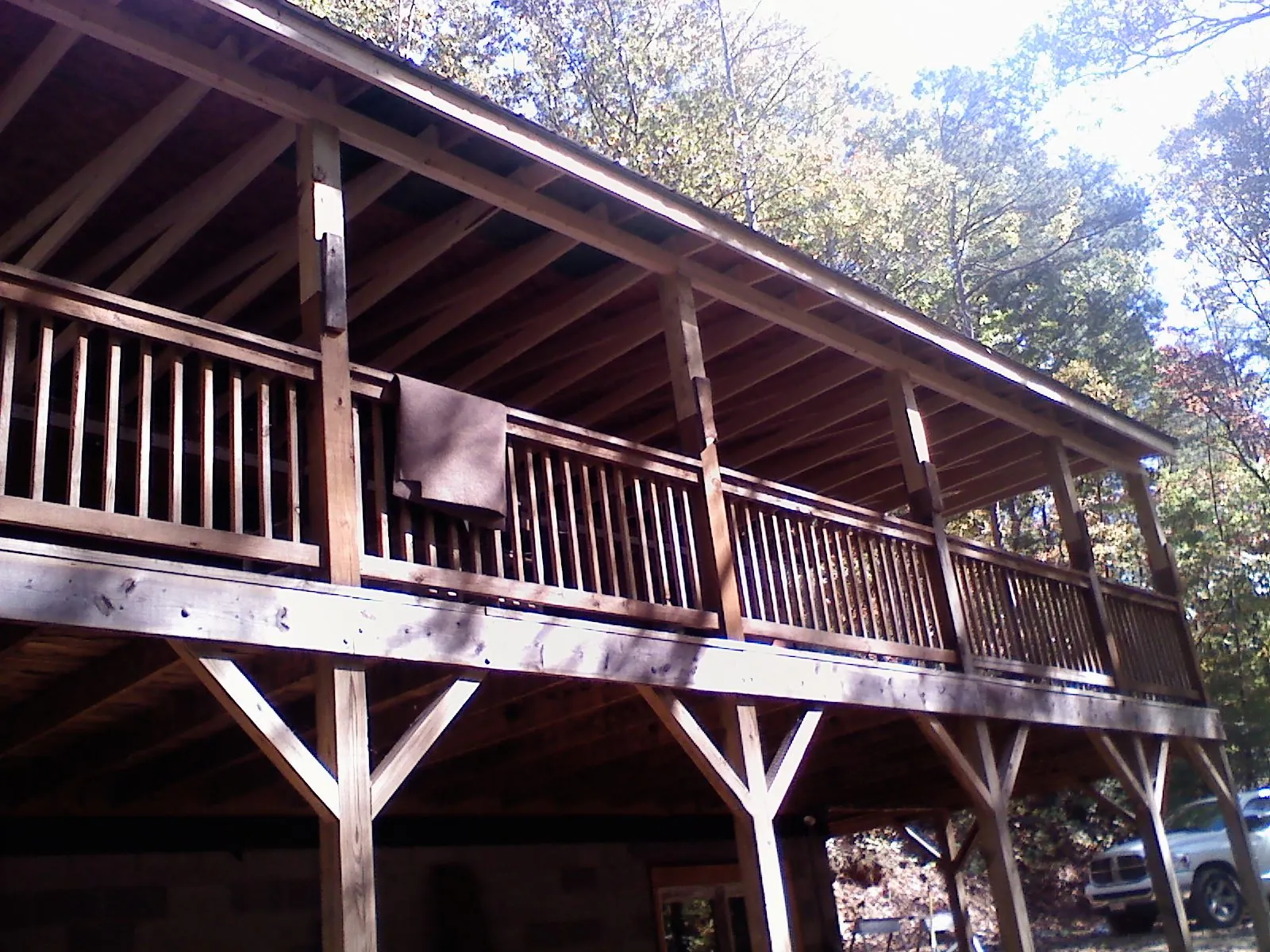 Timber framing under a new elevated porch and deck — Roof Leak Repair in Leo by Roofing Brothers
